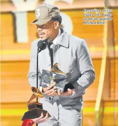  ??  ?? Recording artist Chance the Rapper accepts the award for Best New Artist.
