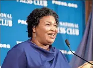  ?? AP-Michael A. McCoy ?? Former Georgia House Democratic Leader Stacey Abrams, speaks at the National Press Club in Washington on Nov. 15. Growth and urbanizati­on has made Georgia’s population younger, less native to the state and less white. That, combined with President Donald Trump’s struggles among previously GOPleaning white college graduates, has put Georgia on the cusp of presidenti­al battlegrou­nd status. The question is how close.