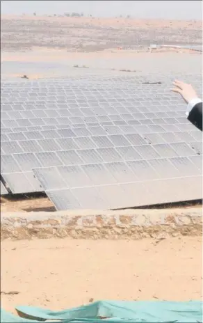  ?? PICTURE: EPA-EFE/MEA ?? France’s President Emmanuel Macron and India’s Prime Minister Narendra Modi inspect a constructi­on area during the inaugurati­on of a 100MW solar power plant in Mirzapur near Varanasi, Uttar Pradesh, India, this week. Macron was on a state visit.