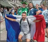  ??  ?? Fraternity: French and Irish fans yesterday