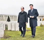  ??  ?? David Cameron and François Hollande visited the Pozieres British Memorial near Amiens, left, to commemorat­e those who died at the Somme. They also held a press conference, right, in the city in which they suggested that a vote to leave the EU could see migrants in Calais heading for Britain