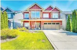  ??  ?? This home at 11762 231B Street in Maple Ridge sold for $1,052,500, over the $889,000 asking price.