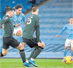  ??  ?? Manchester City’s Ilkay Gundogan scores his side’s second