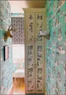  ?? Sheila Bridges / Handout ?? Sheila Bridges's laundry room in New York features some of the Harlem Toile wallpaper she designed.