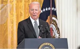  ?? EVAN VUCCI/AP ?? President Joe Biden is seeking to kill a Republican measure that bans the government from considerin­g environmen­tal impacts or potential lawsuits when making investment decisions for Americans’ retirement plans.