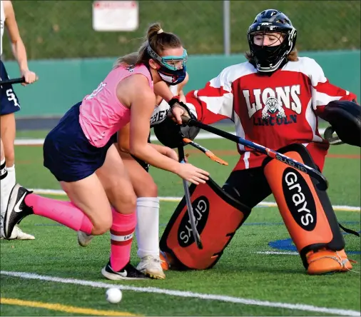  ?? File photo by Jerry Silberman / risportsph­oto.com ?? Not only did Lincoln senior defender Drew Swanson spearhead a defense that didn’t allow a goal in the Division II playoffs, but she also scored the game-winning goal in the Division II semifinal win over Burrillvil­le. Swanson is the 2020 Call/Times Field Hockey MVP.