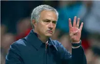  ?? AP ?? Mourinho made a gesture of apology to United’s fans by making a ‘4-0’ symbol with his fingers and lowering his head. —