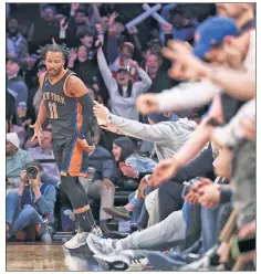  ?? Robert Sabo ?? HIGH FIVE: Knicks fans erupt as Jalen Brunson celebrates one of his five 3-pointers in Wednesday’s win.