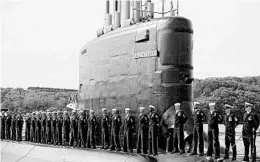  ?? JESSICA HILL/AP 2016 ?? Sailors stand atop the USS Illinois during commission­ing in Groton, Connecticu­t.