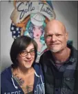  ??  ?? Paula Torelli and tattoo artist Brian Sells at SoNo Tattoo at 127 Washington St. in Norwalk on Monday. The couple has operated the shop for two months.