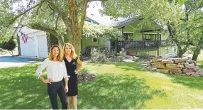  ??  ?? Alison Brennan, left, and Cara George show the backyard of 620 Front Range Road, open today.