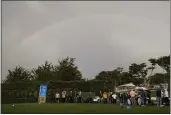  ?? GODOFREDO A. VÁSQUEZ — THE ASSOCIATED PRESS ?? A rainbow can be seen over the 17th tee of the Pebble Beach Golf Links before players resumed play in the third round of the AT&T Pebble Beach Pro-Am golf tournament in Pebble Beach on Sunday.