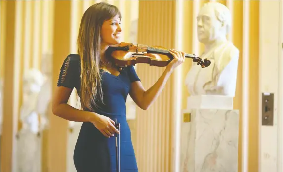  ?? JEFF J MITCHELL/GETTY IMAGES ?? “You just have to keep the visual thing in its place,” says violinist Nicola Benedetti, and “behave with as much integrity as possible.”