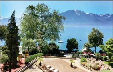  ?? AMANDA LOUDIN/THE WASHINGTON POST ?? A room with a view: Lake Geneva as seen from the Fairmont Montreux Palace in Montreux, Switzerlan­d.