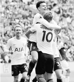  ??  ?? Tottenham’s Harry Kane (right) celebrates scoring the first goal with Dele Alli during the English Premier League match against West Ham United at London Stadium in London, Britain in this Sept 23 file photo. — Reuters photo