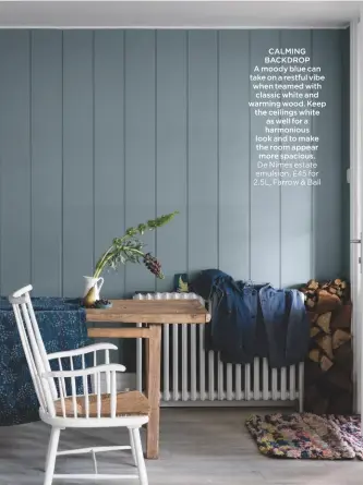  ??  ?? CALMING BACKDROP A moody blue can take on a restful vibe when teamed with classic white and warming wood. Keep the ceilings white as well for a harmonious look and to make the room appear more spacious. de nimes estate emulsion, £45 for 2.5L, Farrow &amp; Ball