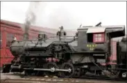  ?? MARVIN FONG ?? On April 15, exhaust streams from a locomotive at the Age of Steam Roundhouse in Sugarcreek, Ohio.