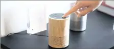  ??  ?? Amazon.com’s smaller and cheaper version of its popular Alexa-powered Echo, which is equipped with a chatbot that will play music on your request or do searches on your behalf. I DANIEL BERMAN Bloomberg