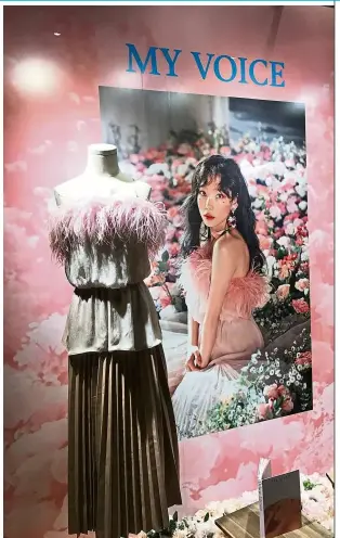  ??  ?? The dress that Girls’ Generation’s Taeyeon wore for her MakeMeLove­You music video is on display.