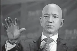  ?? [THE ASSOCIATED PRESS FILE PHOTO] ?? Amazon founder Jeff Bezos says the National Enquirer wanted him to stop investigat­ing where it got salacious photos and to declare that the Enquirer’s coverage of Bezos was not politicall­y motivated.