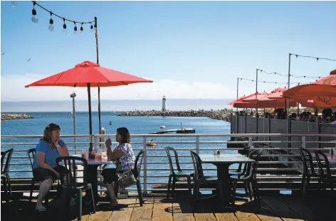  ?? Photos by Preston Gannaway / Special to The Chronicle ?? Outdoor seating by the water can be glorious at the funky Aldo's Harbor Restaurant in Santa Cruz.