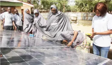  ??  ?? Female solar technician­s trained by Internatio­nal Center for Energy, Environmen­t and Developmen­t