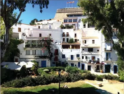  ?? PHOTOS BY MARY WINSTON NICKLIN, FOR THE WASHINGTON POST ?? The houses of “Eivissa” — Ibiza Town — first were whitewashe­d in ancient times as a means to ward off the plague, bacteria and illness.