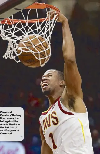  ?? AP ?? Cleveland Cavaliers’ Rodney Hood dunks the ball against the Atlanta Hawks in the first half of an NBA game in Cleveland.