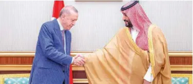  ?? Agence France-presse ?? ↑
Mohammed Bin Salman (right) greets Tayyip Erdogan in Jeddah on Friday.