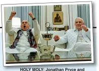  ??  ?? HOLY MOLY: Jonathan Pryce and Anthony Hopkins in The Two Popes