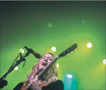  ?? Kent Nishimura Los Angeles Times ?? COUNTRY SINGER-guitarist-sometime-drummer Margo Price plays her heart out at the Fonda Theatre.