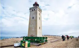  ??  ?? The 80-metre move of the lighthouse Rubjerg Knude cost £580,000. Photograph: Henning Bagger/EPA