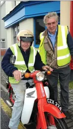  ??  ?? Johnny McElligott and Denis Tangney getting ready for this year’s Mid Kerry Vintage Rally.