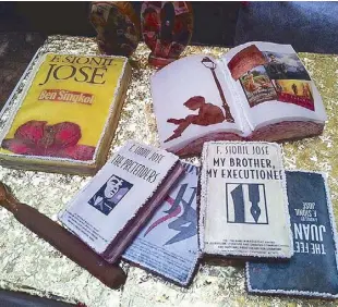  ??  ?? The cake celebratin­g F. Sionil Jose’s 90th birthday was a literary feast.