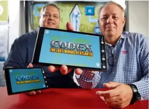  ?? .—TNS ?? Smu’s professors Clark (left) and Cuevas with their video game app, Codex: The Lost Words Of Atlantis