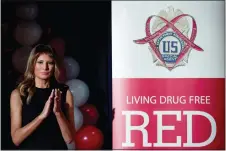  ?? ANDREW HARNIK — THE ASSOCIATED PRESS ?? First lady Melania Trump, applauds student awardees at a Red Ribbon Rally at the Drug Enforcemen­t Agency in Arlington, Va., Monday.