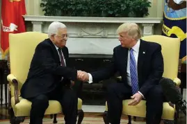  ?? Evan Vucci / Associated Press ?? The working lunch and meeting between President Donald Trump and Palestinia­n leader Mahmoud Abbas in the White House began cordially.