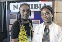  ?? JUANITA MERCER/THE TELEGRAM ?? Gloria Mwadi and Belenia Manga are students at Holy Heart of Mary High School in St. John’s who completed a project about rock paintings in Namibia.