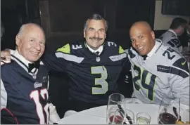  ?? ?? TOM GIRARDI, left, then-LAPD Chief Charlie Beck and Lorenzo Robert Savage, head of L.A.’s Secret Service office, at Girardi’s Super Bowl party in 2015.