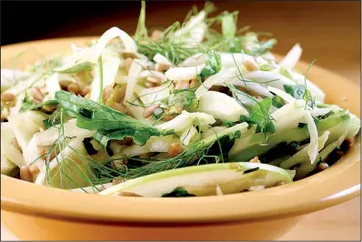  ?? Chicago Tribune/ TNS/ MICHAEL TERCHA ?? Arugula gives this fennel slaw a peppery touch while sunfl ower kernels provide crunch.