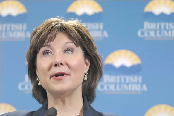  ?? — THE CANADIAN PRESS FILES ?? B.C. Premier Christy Clark talks with media after being sworn-in as Premier following a ceremony at Legislatur­e in Victoria, B.C., on June 8. Clark and the Liberals have changed their positions on a number of issues in hopes of winning support.