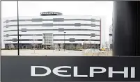  ?? (AP) ?? In this March 22, 2006, file photo, Delphi’s World Headquarte­rs is shown in Troy, Mich. Automotive electronic­s and parts maker Delphi and French transport company Transdev have plans to use autonomous taxis and a shuttle van to carry passengers on...