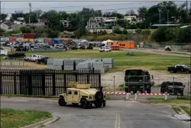  ?? RAQUEL NATALICCHI­O — HOUSTON CHRONICLE VIA AP ?? National Guard and other law enforcemen­t are stationed at a now closed off Shelby Park, Wednesday, March 20, 2024, in Eagle Pass, Texas.