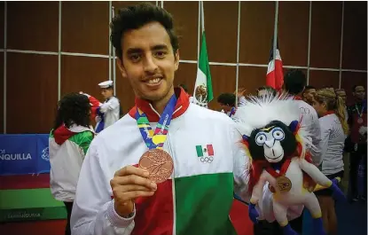  ?? ESPECIAL El poblano Marcos Madrid Mantilla consiguió la medalla de oro en la prueba individual de tenis de mesa. ??