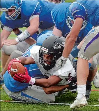  ?? DANA JENSEN/THE DAY ?? Valley Regional/Old Lyme’s Jae’len Arnum (5) dives and reaches the ball over the goal line for a touchdown during the Warriors’ 40-10 win over Old Saybrook/Westrook on Saturday at Old Saybrook. Arnum scored four touchdowns as Valley/Old Lyme remained unbeaten.