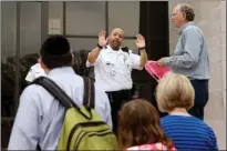  ??  ?? A security guard turns visitors away from the Smithsonia­n’s National Air and Space Museum Tuesday in Washington, D.C., after widespread power outages cause many of the buildings along the National Mall to shut down temporaril­y.