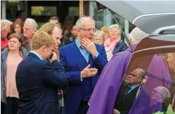  ??  ?? Grief: Rory Cowan at his mother’s funeral on Thursday