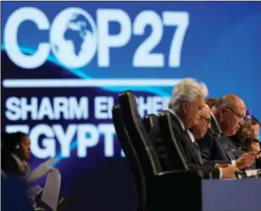  ?? (AP/Peter Dejong) ?? Sameh Shoukry (right), president of the COP27 climate summit, speaks during a closing plenary session Sunday at the U.N. Climate Summit in Sharm el-Sheikh, Egypt.