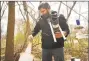  ?? Brian A. Pounds / Hearst CT Media ?? John Shepard, of the Connecticu­t Agricultur­al Experiment Station, sets mosquito traps in Milford in 2018.