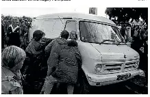  ?? JOHN SELKIRK/STUFF ?? Rugby supporters, upset as they left the cancelled game, attempt to tip over a van being used as a makeshift ambulance, after both factions spilled out of the grounds.